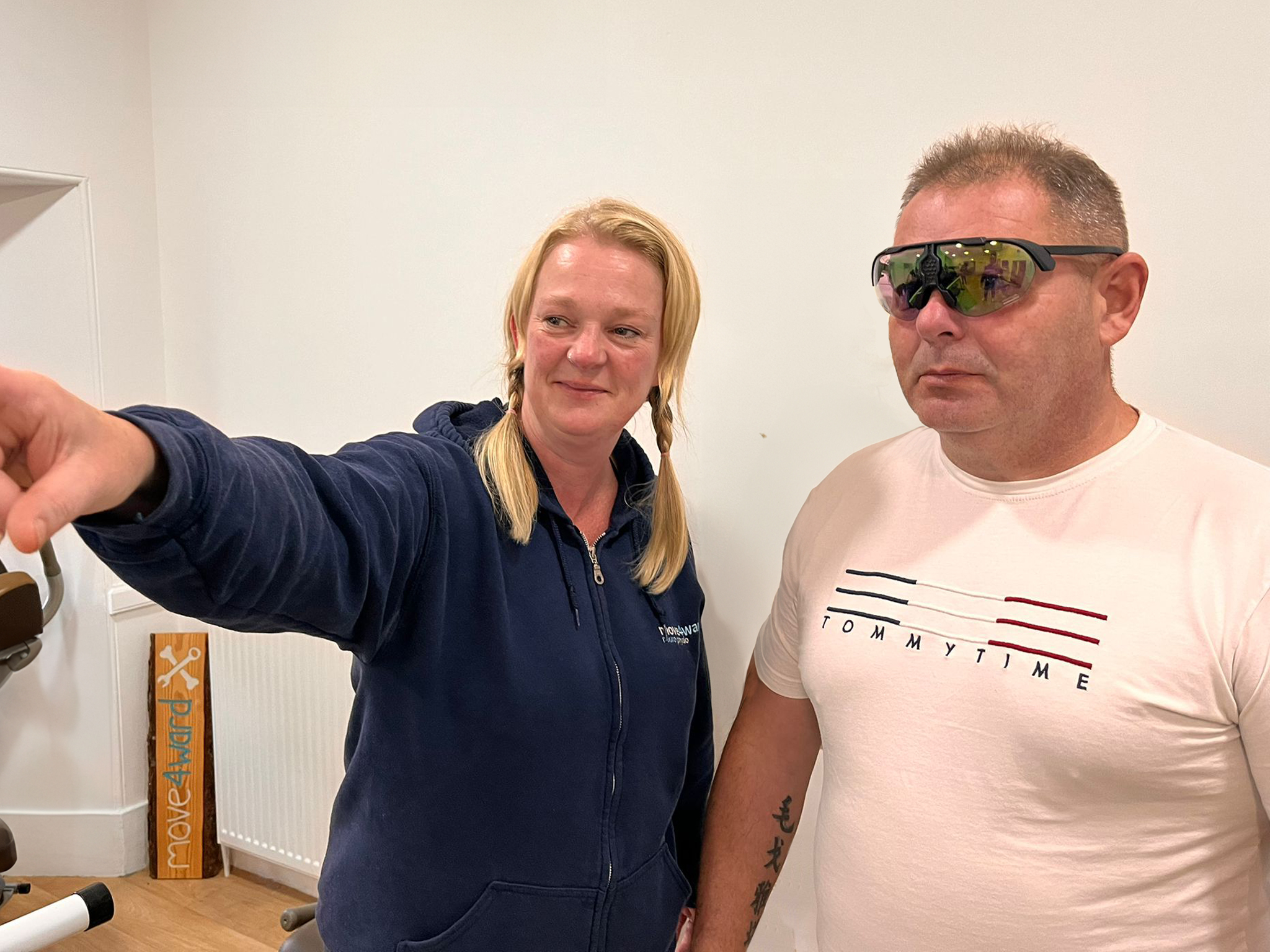 Physio working with a patient